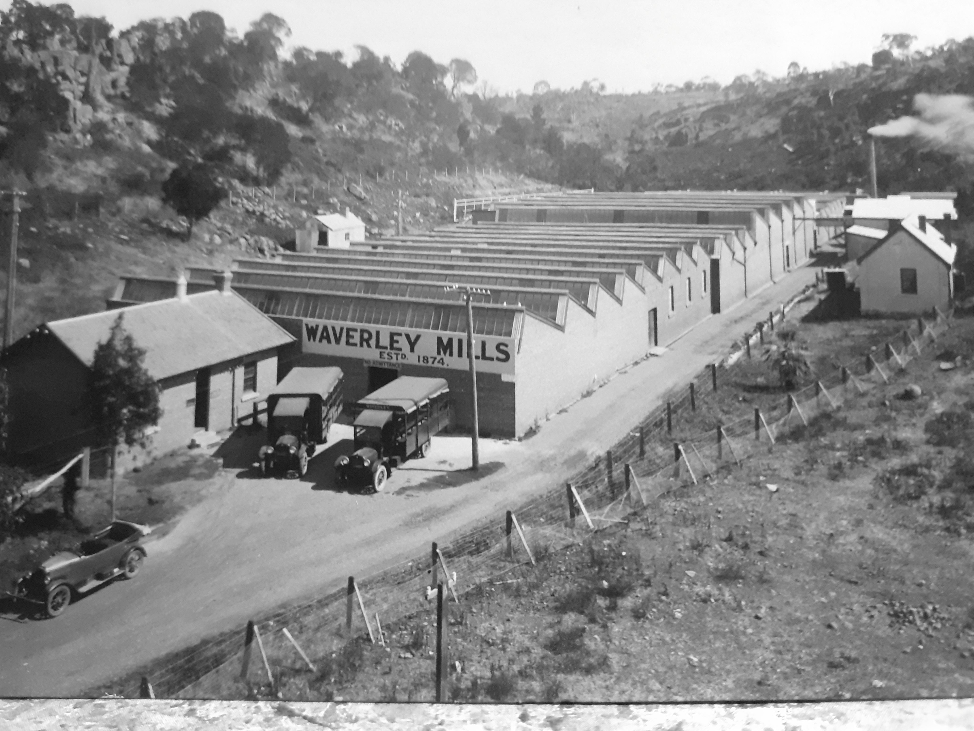 Historic image of the mill in black and white.