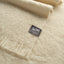 Close up of the natural alpaca throw showing the soft texture.