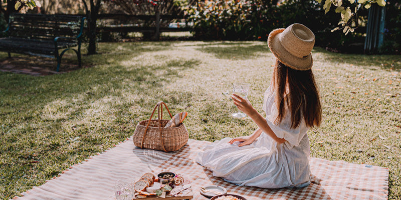 Connie Cao picnicking on a Waverley Mills pure wool picnic rug.