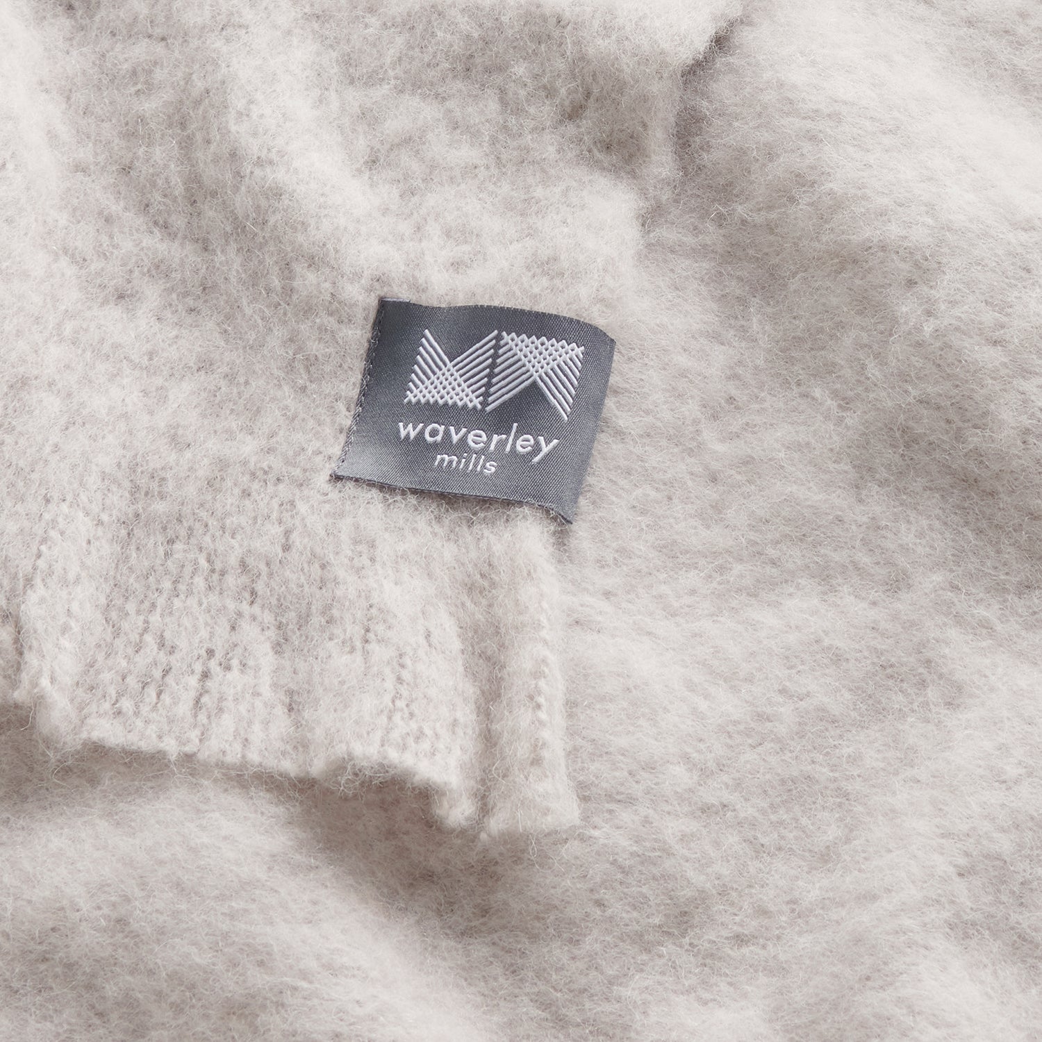Close up of chroma throw in opal grey.