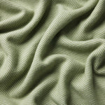 Close up of a flint blanket in moss showing the contrasting twill weave and drape.