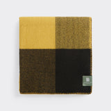Folded heroes check travel rug.