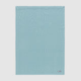 Full view of pure merino wool baby blanket in blue.