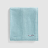 Folded baby blanket Nest in stone blue.