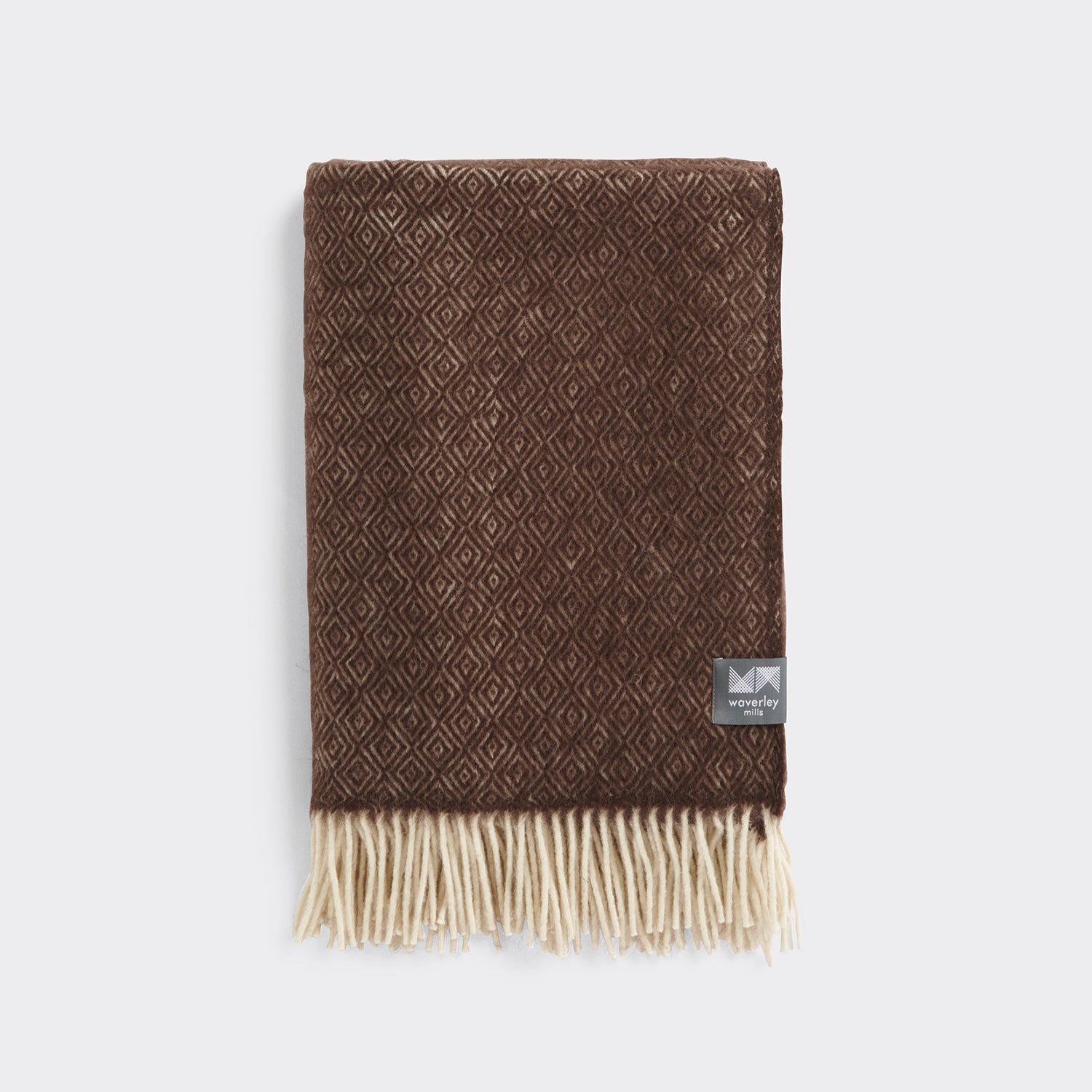 A folded diamond knee rug in chocolate.