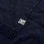 A close up of an essential throw in navy eclipse.