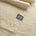 Close up of the natural alpaca throw showing the soft texture.