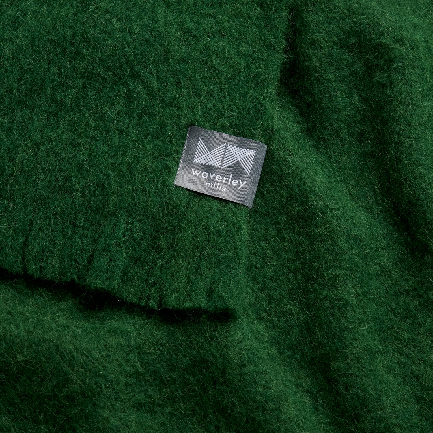 Close up of chroma throw in forest green.