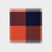 Full view of graze picnic rug showing bold geometric pattern in orange and navy.