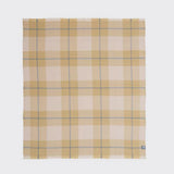 Full view of a modern heritage throw in tan.