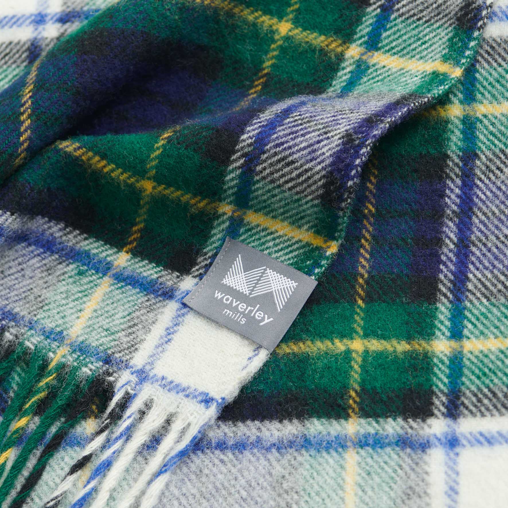 Close up of traditional wool picnic rug in Dress Gordon Tartan.