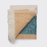 Folded stripe throw in tan, green and natural