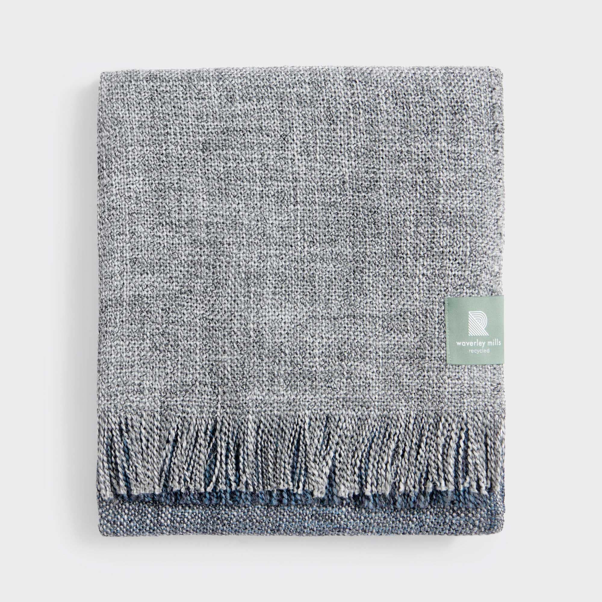 Folded midnight boucle throw.