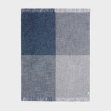 Full view of midnight big check boucle throw showing oversize check pattern.