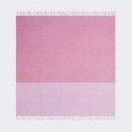 Full view of tonal twisted throw in pink.