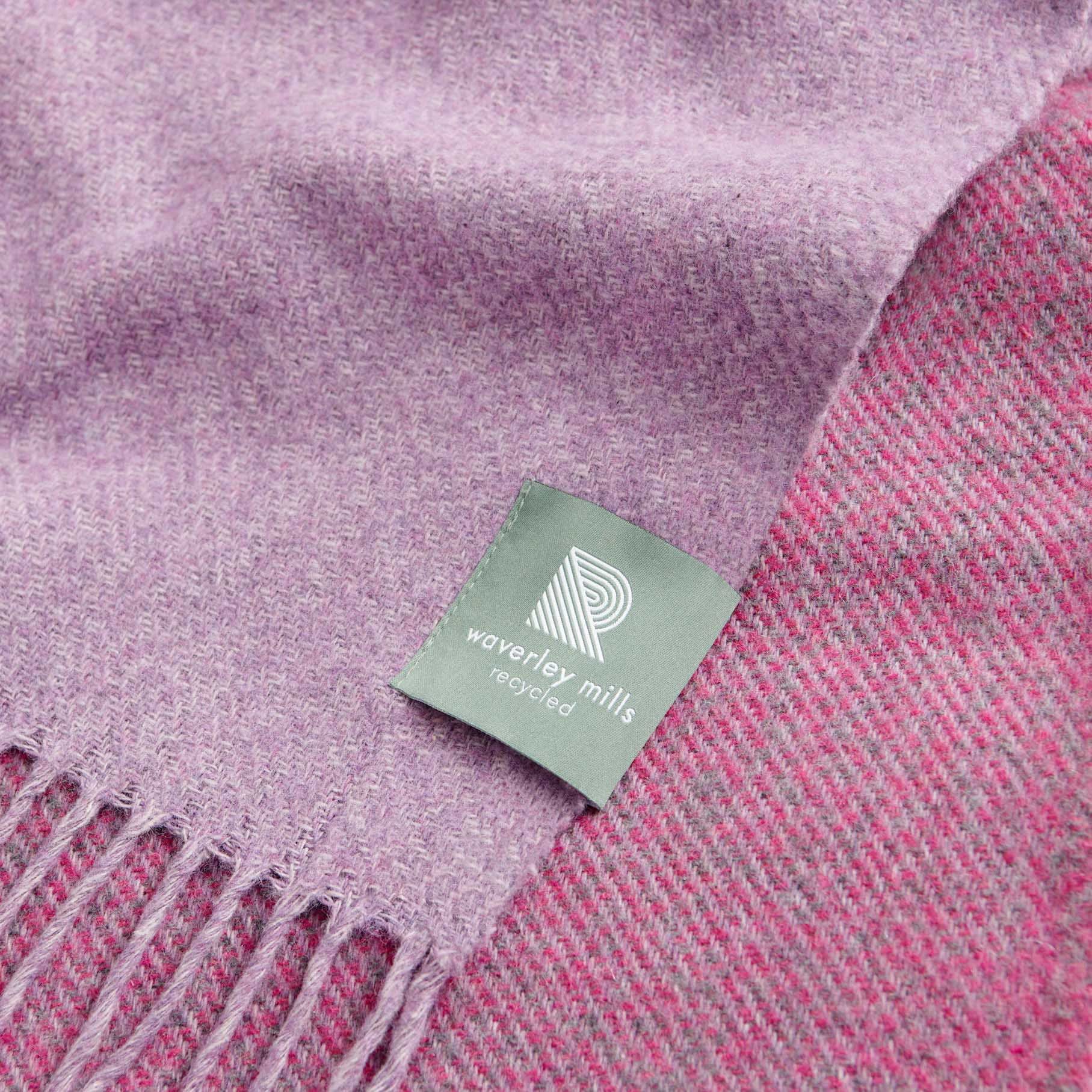 Close up of pink tonal twisted throw.