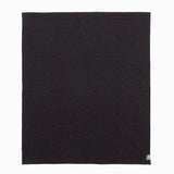 A full view of the darkest hour throw, showing the distribution of the coloured speckles.